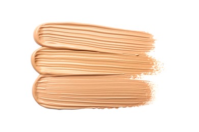 Sample of liquid skin foundation on white background, top view