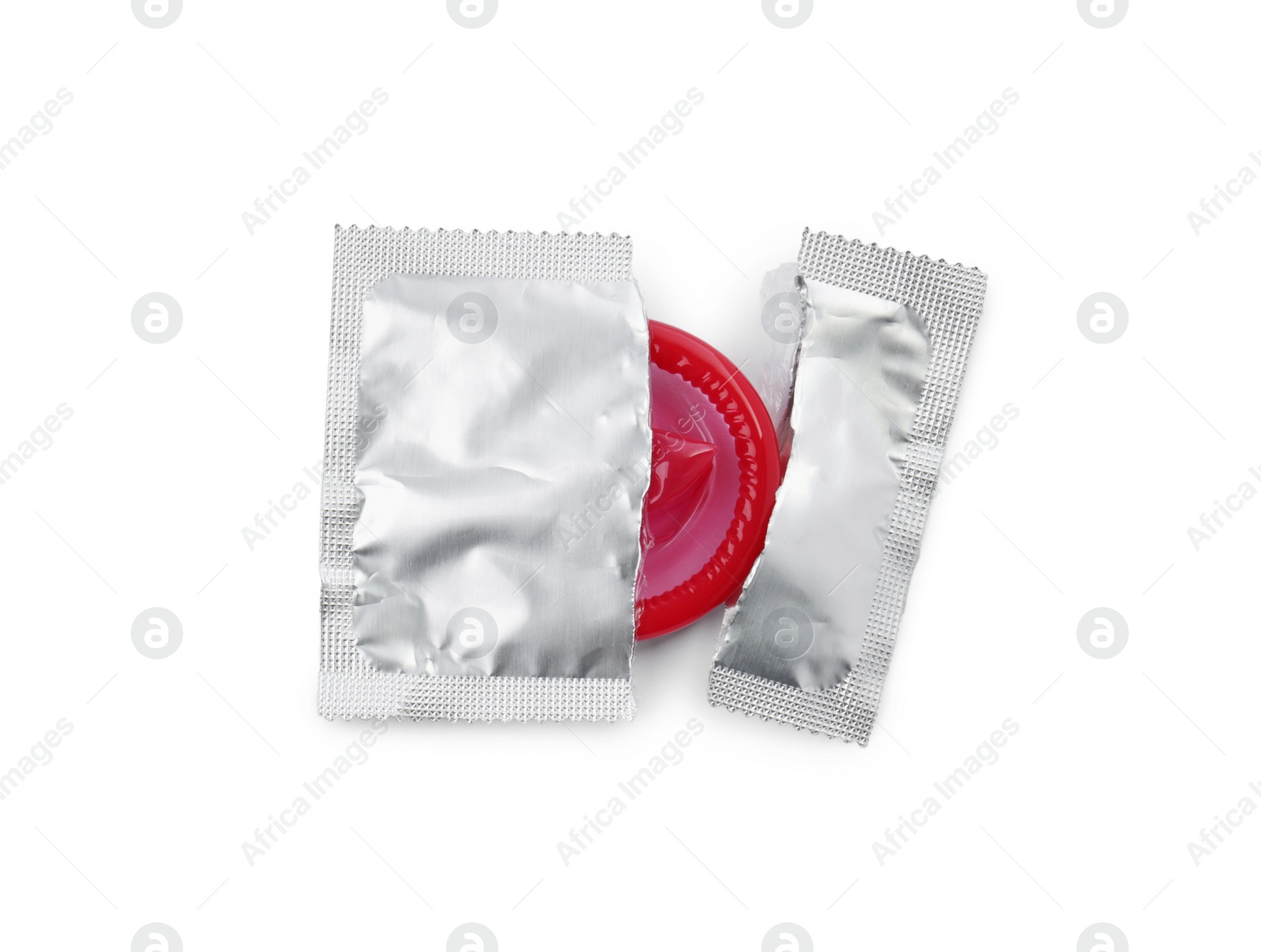 Photo of Condom in torn package on white background, top view. Safe sex