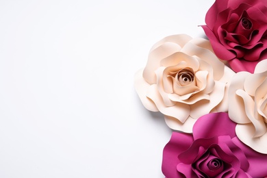 Photo of Different beautiful flowers made of paper on white background, flat lay. Space for text