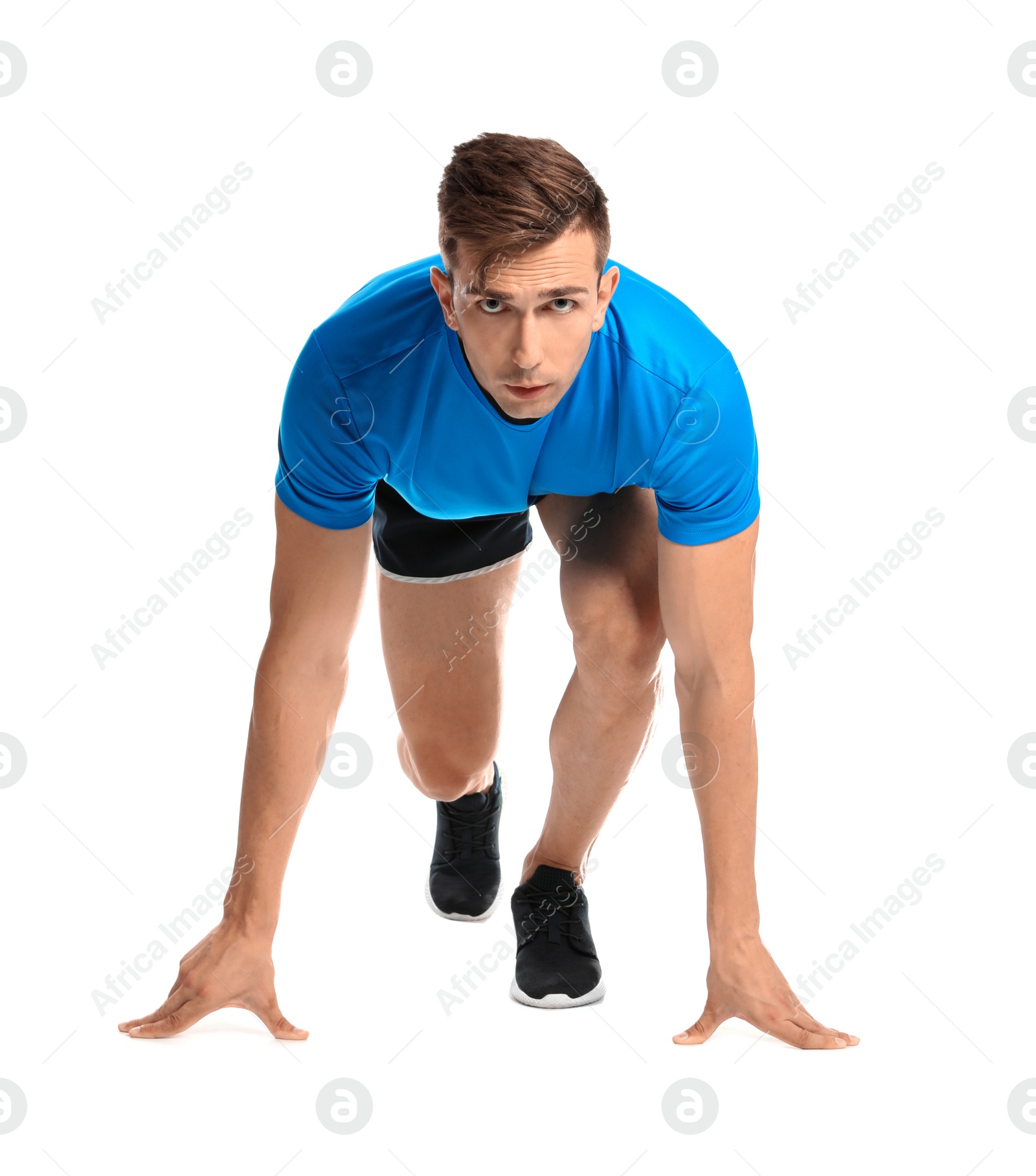 Photo of Sporty young man running on white background