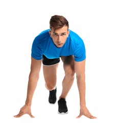 Photo of Sporty young man running on white background