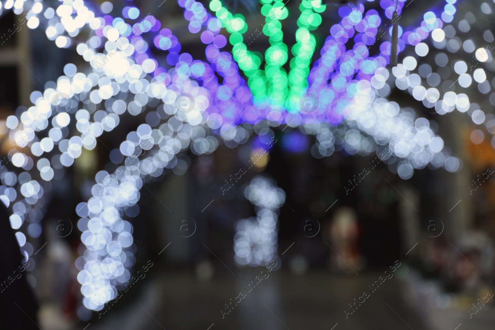 Photo of Beautiful street lights at night. Bokeh effect