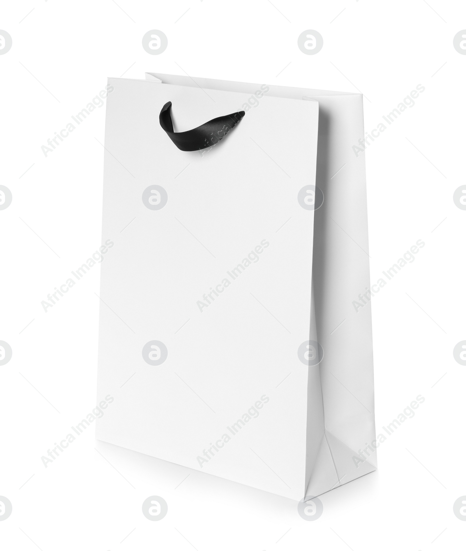 Photo of Paper shopping bag isolated on white. Mock up for design