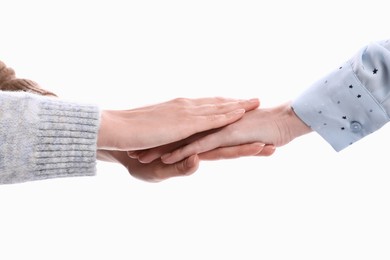 Photo of Women holding hands together on white background, closeup