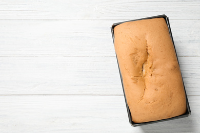 Tasty pear bread on white wooden table, top view
 with space for text. Homemade cake