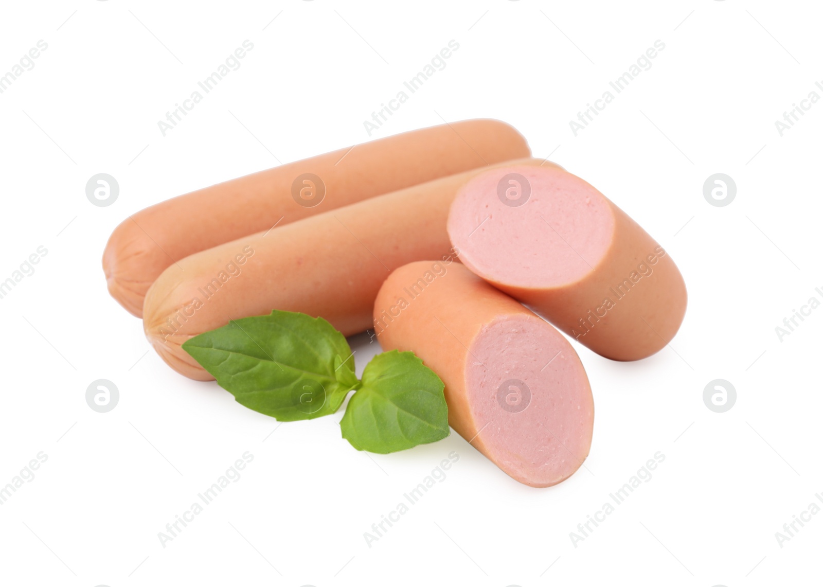 Photo of Whole and cut delicious boiled sausages with basil on white background