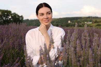 Photo of Portrait of smiling woman in lavender field