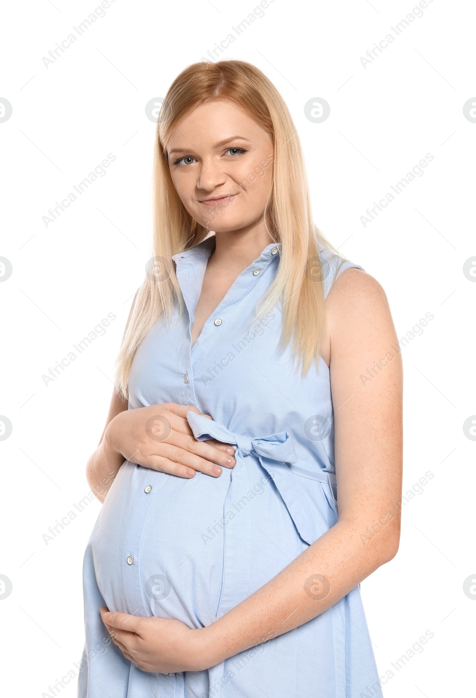 Photo of Beautiful pregnant woman in dress on white background