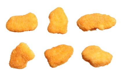 Image of Set of fresh chicken nuggets on white background