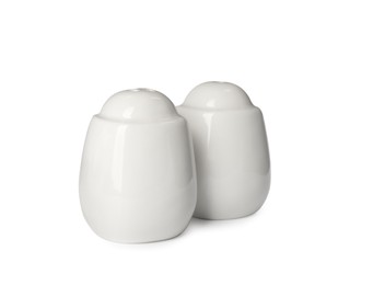 Ceramic salt and pepper shakers isolated on white