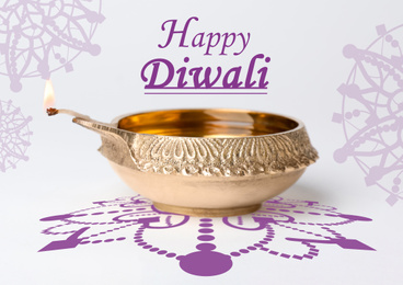 Image of Inscription Happy Diwali and clay lamp on light background