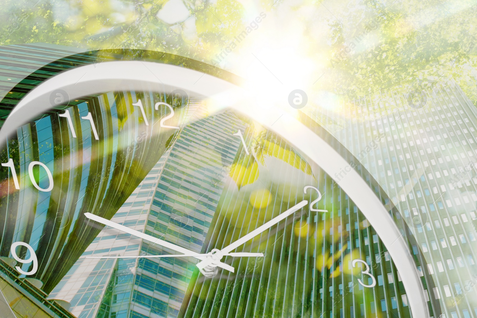 Image of Time related concepts. Multiple exposure of clock, office buildings and trees