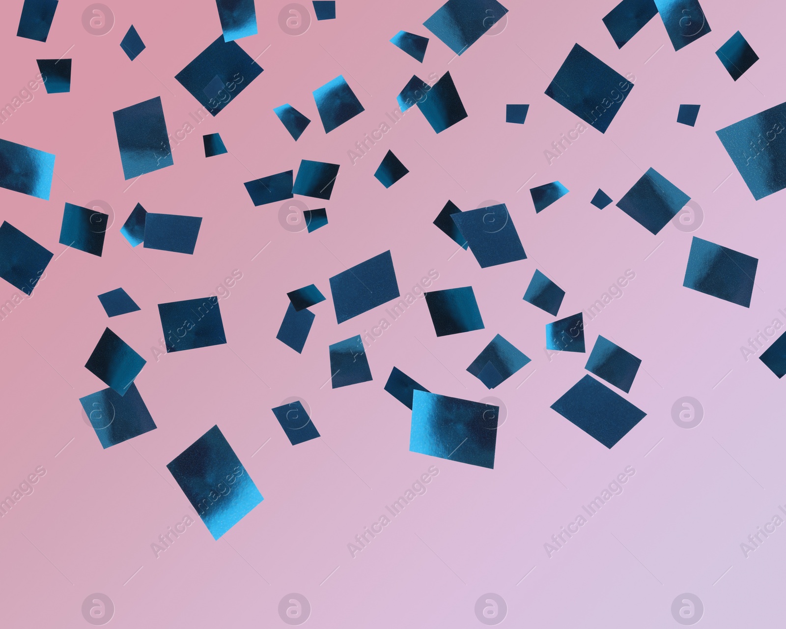 Image of Shiny blue confetti falling on gradient pink background