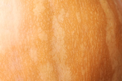 Ripe orange pumpkin as background, closeup view