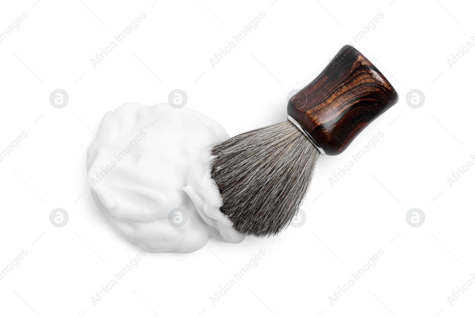 Photo of Shaving brush and foam on white background, top view