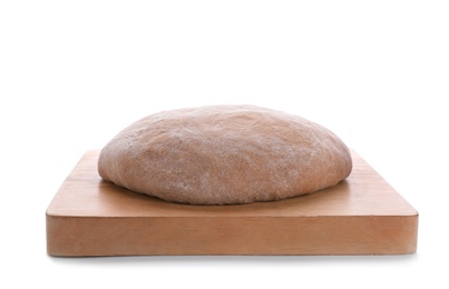 Photo of Wooden board with raw rye dough on white background