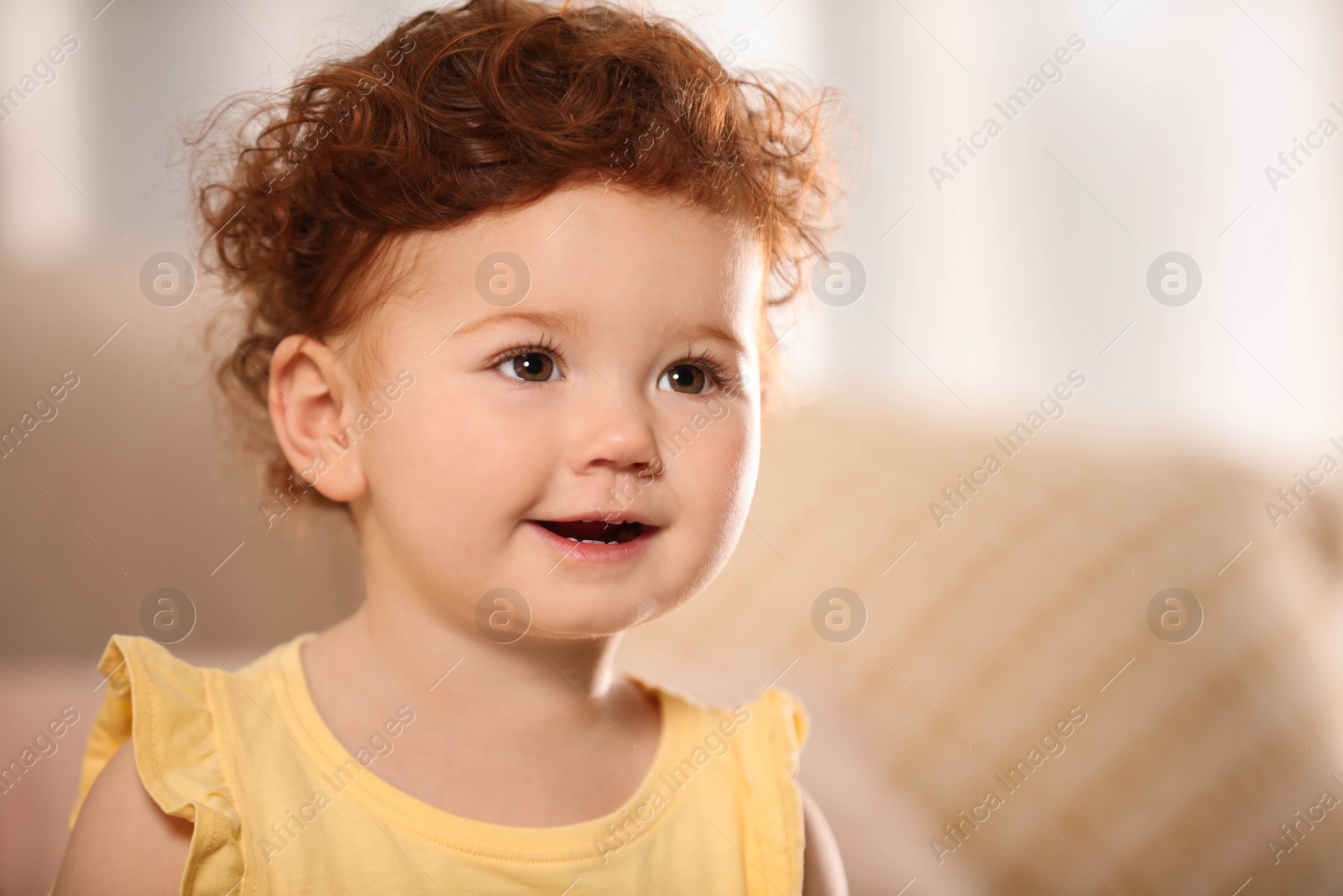 Photo of Portrait of cute little child at home