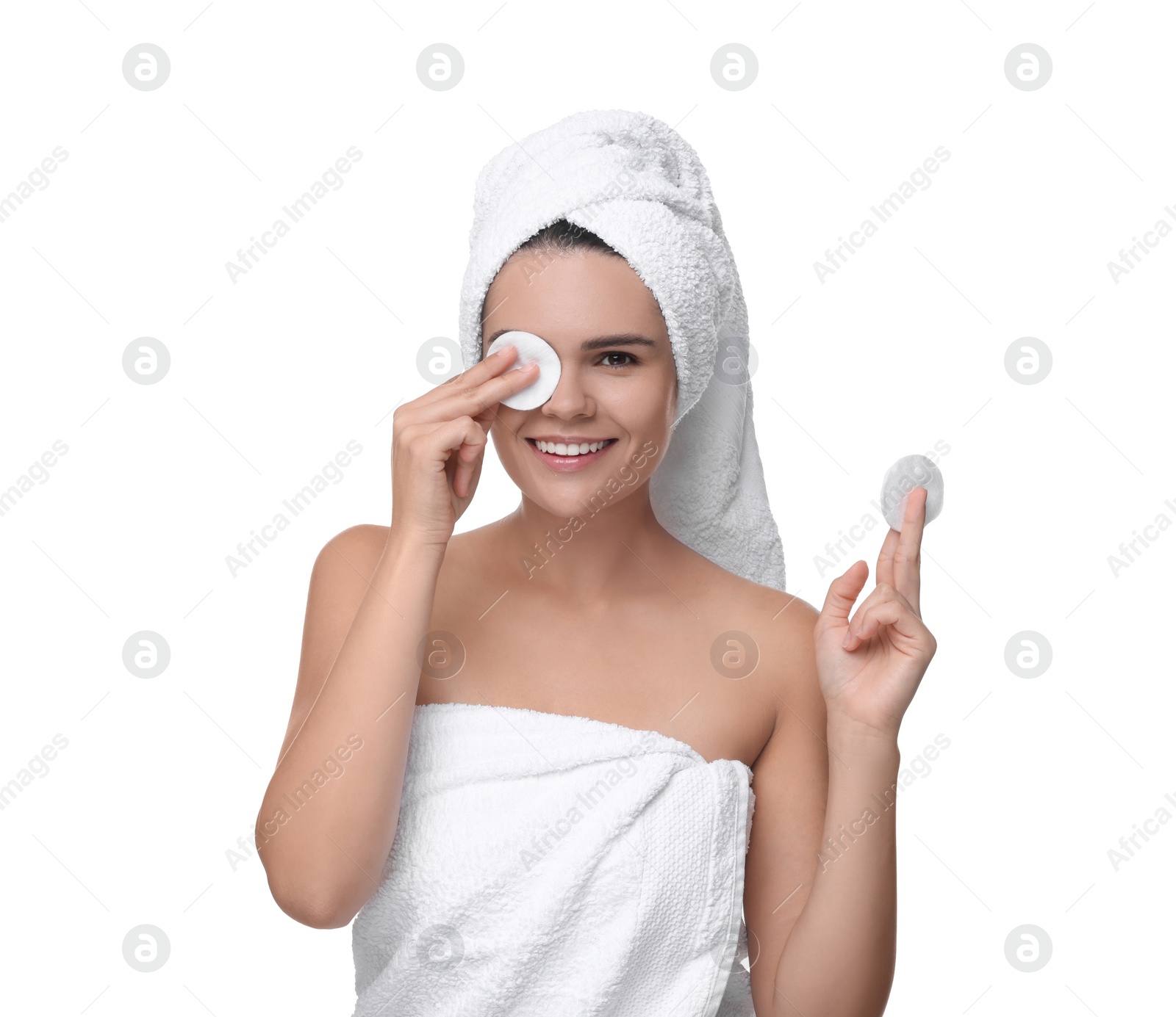 Photo of Young woman with cotton pads on white background