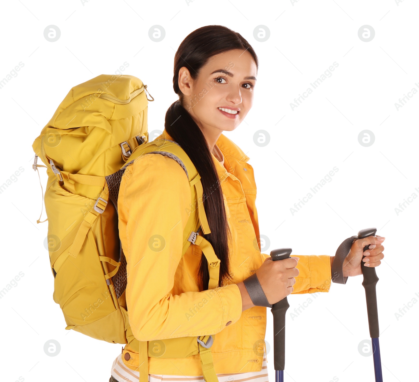 Photo of Female hiker with backpack and trekking poles on white background