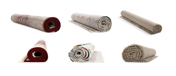 Many different rolled carpets isolated on white, set