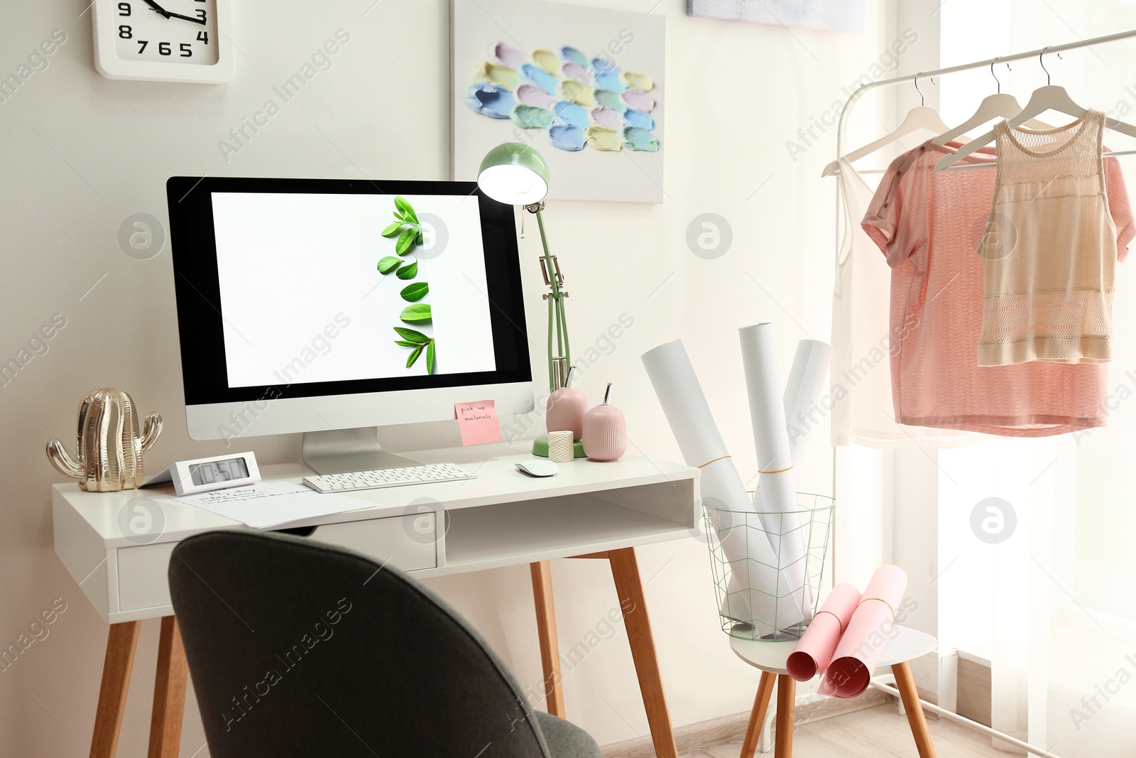 Photo of Designer's workplace with modern computer on table