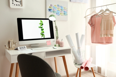 Designer's workplace with modern computer on table