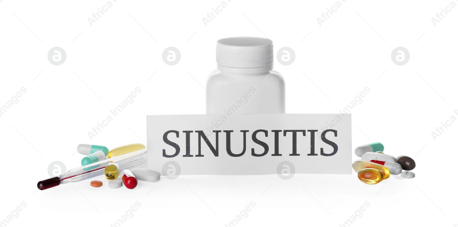 Photo of Card with word SINUSITIS, thermometer and different drugs on white background