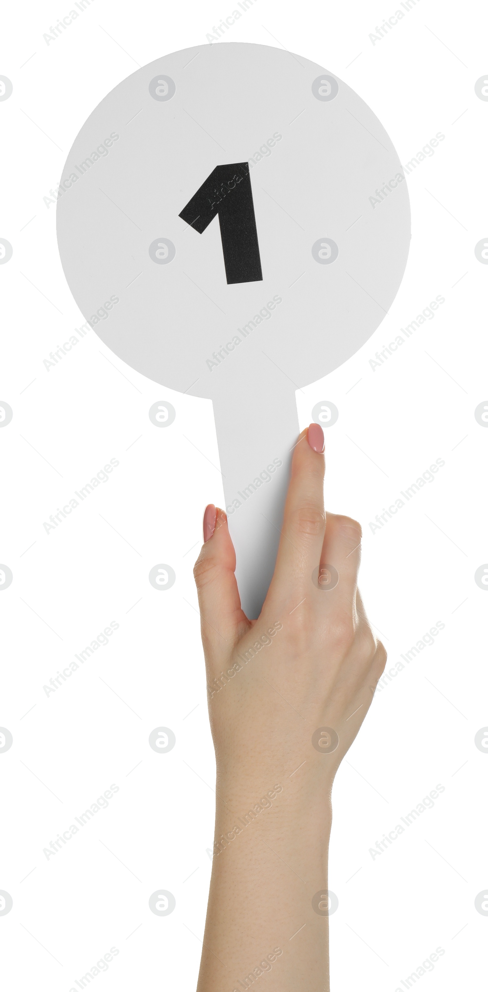 Photo of Woman holding auction paddle with number 1 on white background, closeup