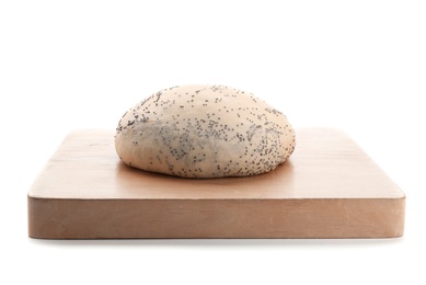 Photo of Wooden board and raw dough with poppy seeds on white background