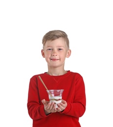 Little boy with yogurt on white background