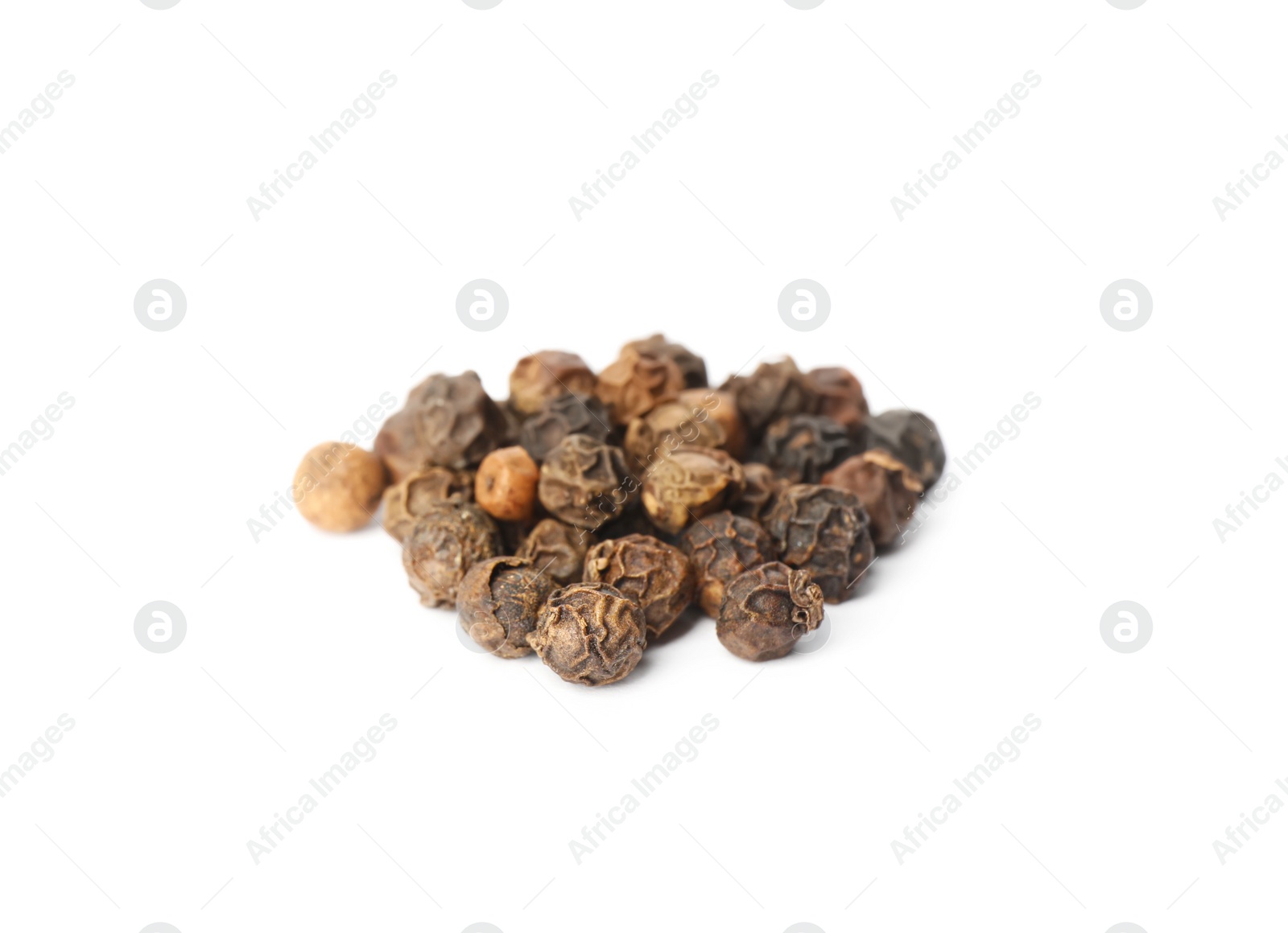 Photo of Black peppercorns on white background. Aromatic spice