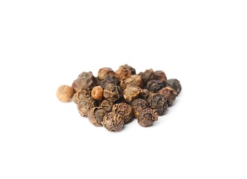 Black peppercorns on white background. Aromatic spice