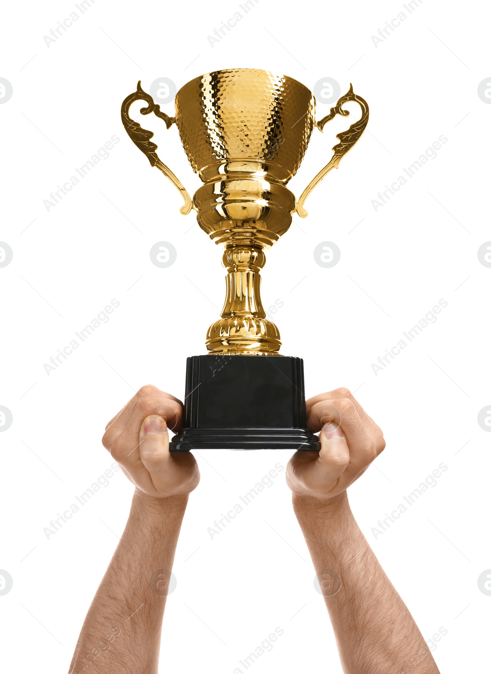 Photo of Young man holding gold trophy cup on white background, closeup