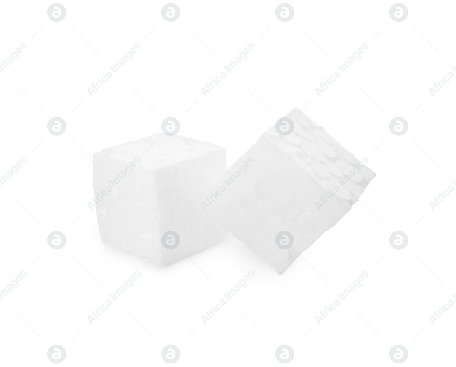 Photo of Two small styrofoam cubes on white background