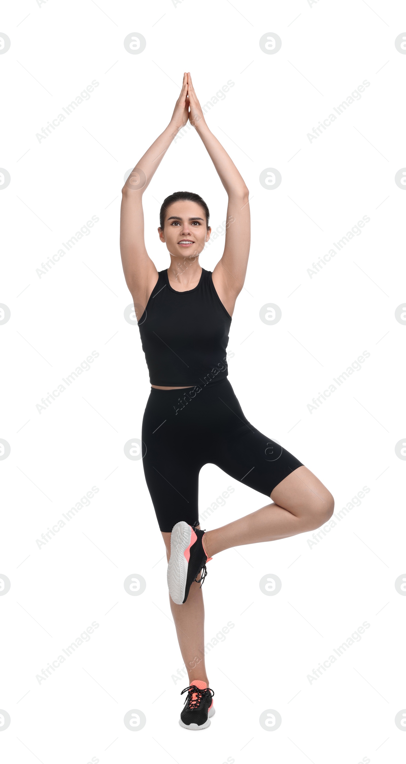 Photo of Happy woman doing morning exercise on white background