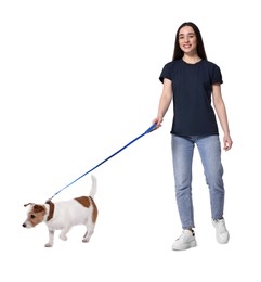 Smiling woman walking with dog on white background