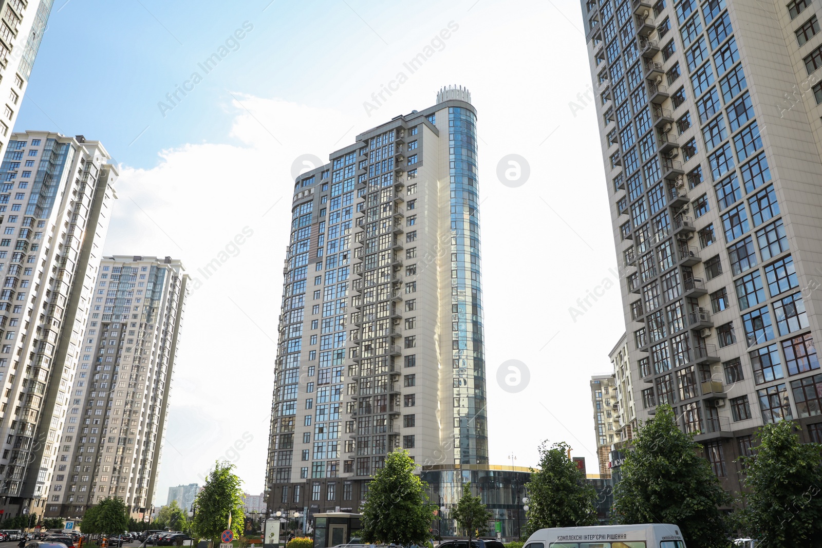 Photo of KYIV, UKRAINE - MAY 21, 2019: Beautiful view of modern housing estate in Pecherskyi district on sunny day