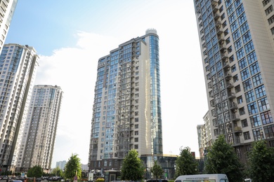 KYIV, UKRAINE - MAY 21, 2019: Beautiful view of modern housing estate in Pecherskyi district on sunny day