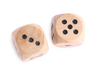 Photo of Two wooden game dices isolated on white, top view