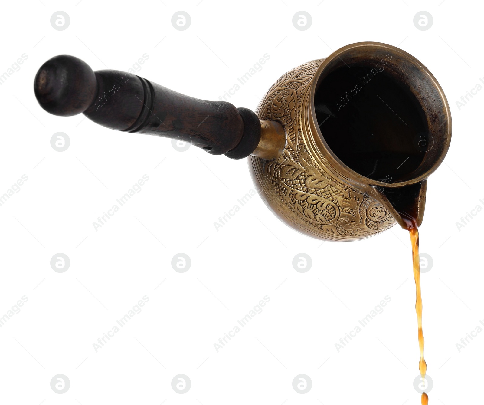 Photo of Turkish coffee. Pouring brewed beverage from cezve on white background