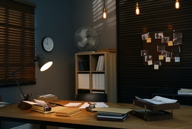 Detective office interior with evidence board on wall