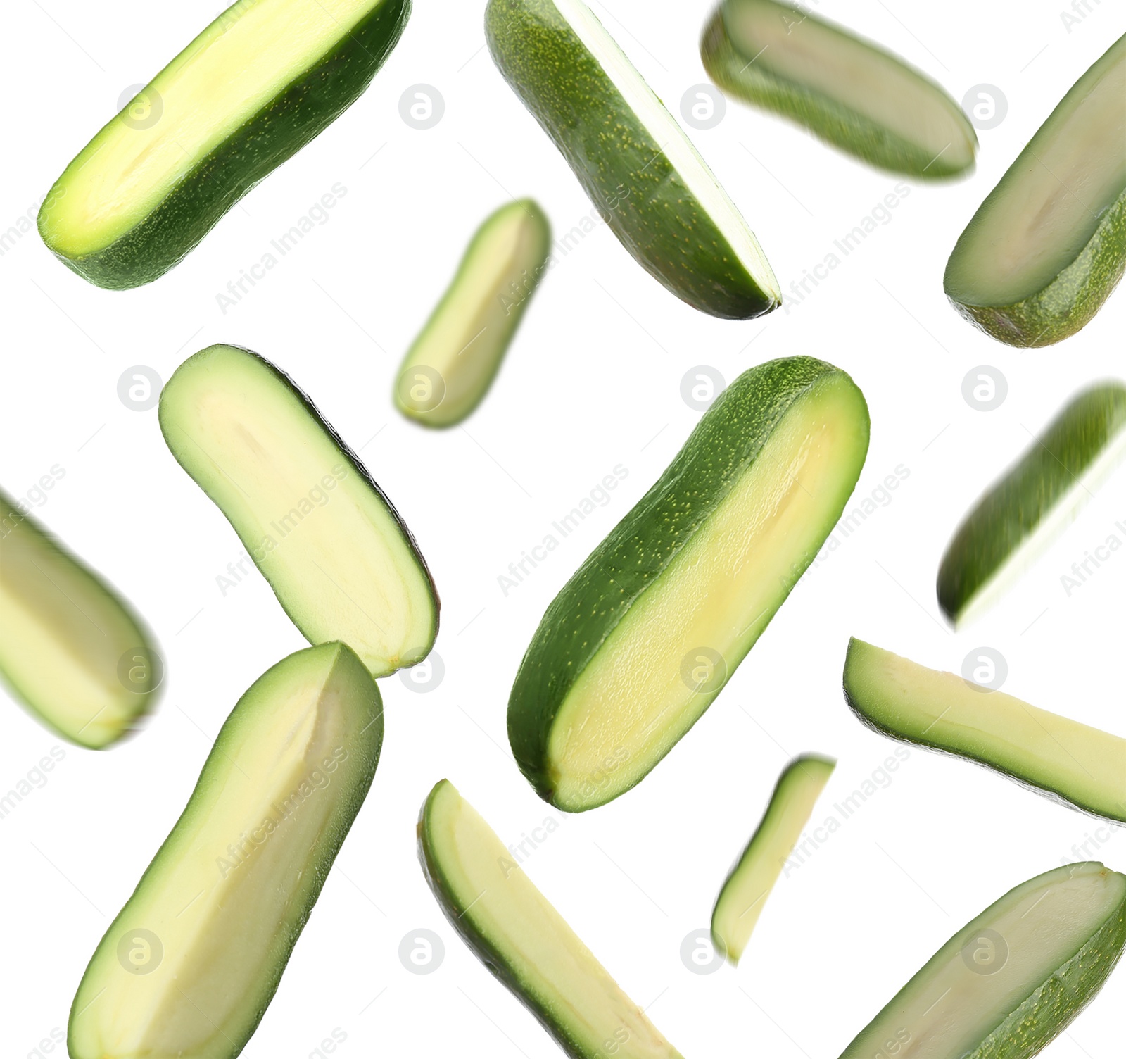 Image of Fresh seedless avocados falling on white background