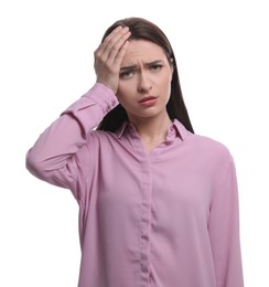 Photo of Woman suffering from headache on white background. Cold symptoms