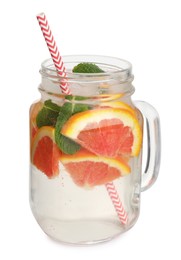 Photo of Delicious refreshing drink with sicilian orange, fresh mint and ice cubes in mason jar isolated on white