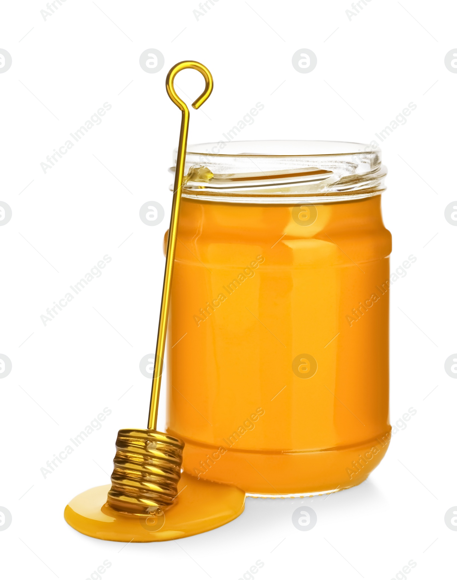 Photo of Jar of organic honey and dipper isolated on white
