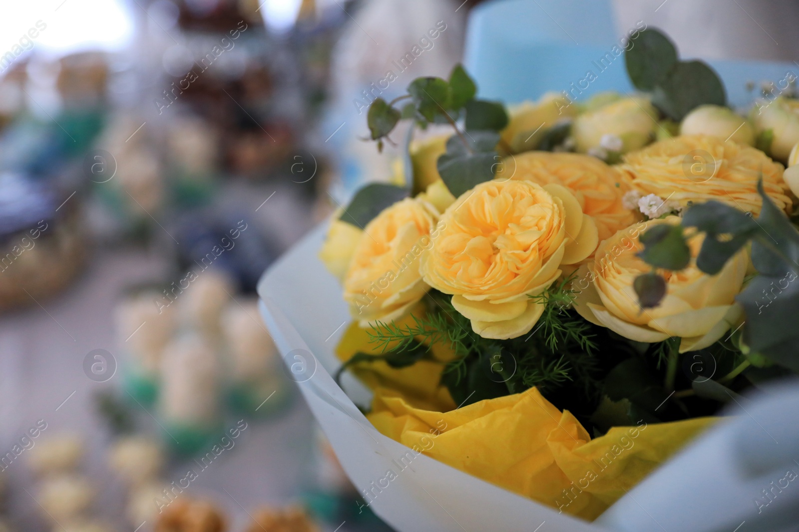 Photo of Beautiful bouquet of yellow roses, closeup. Space for text