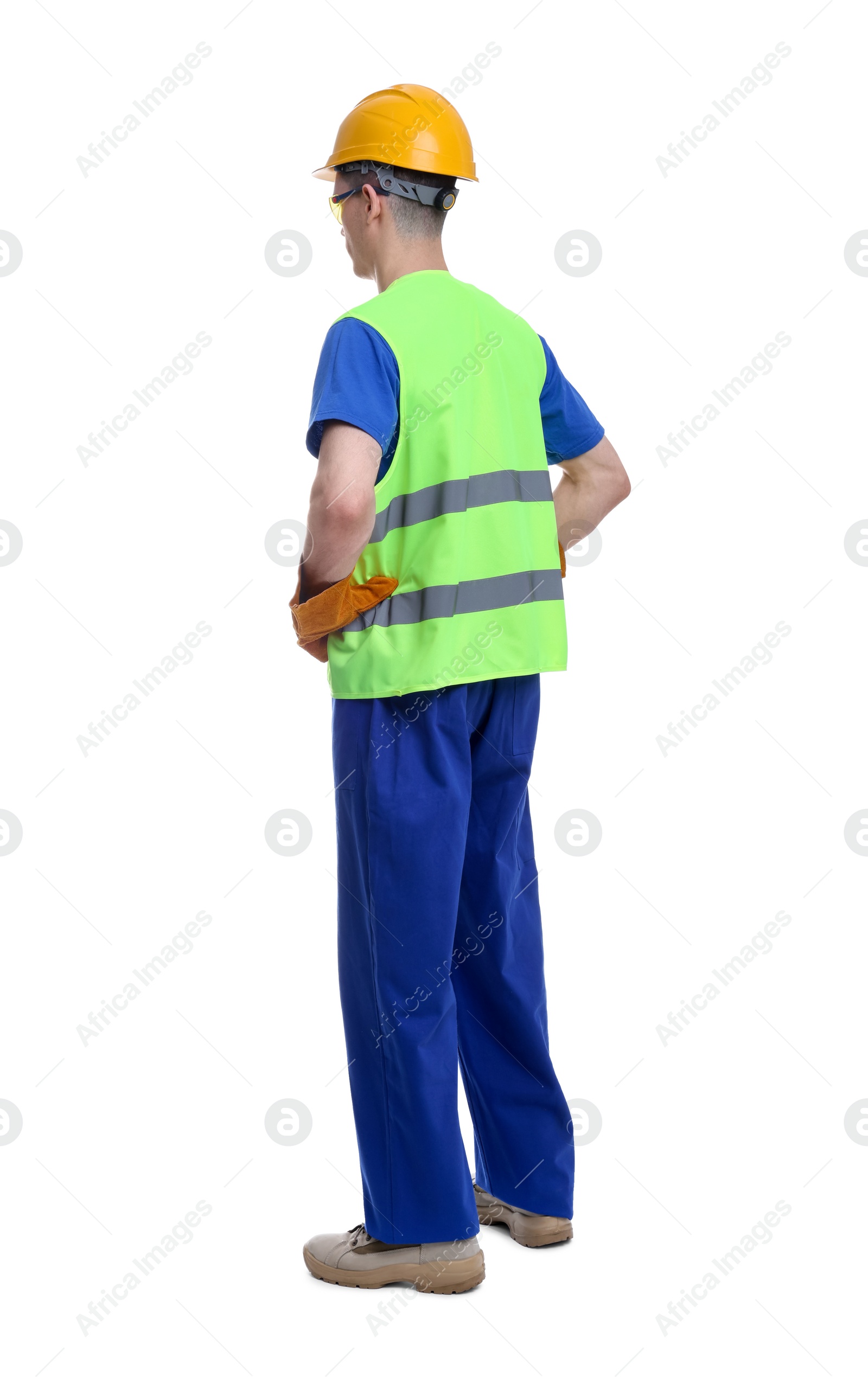 Photo of Young man wearing safety equipment on white background, back view