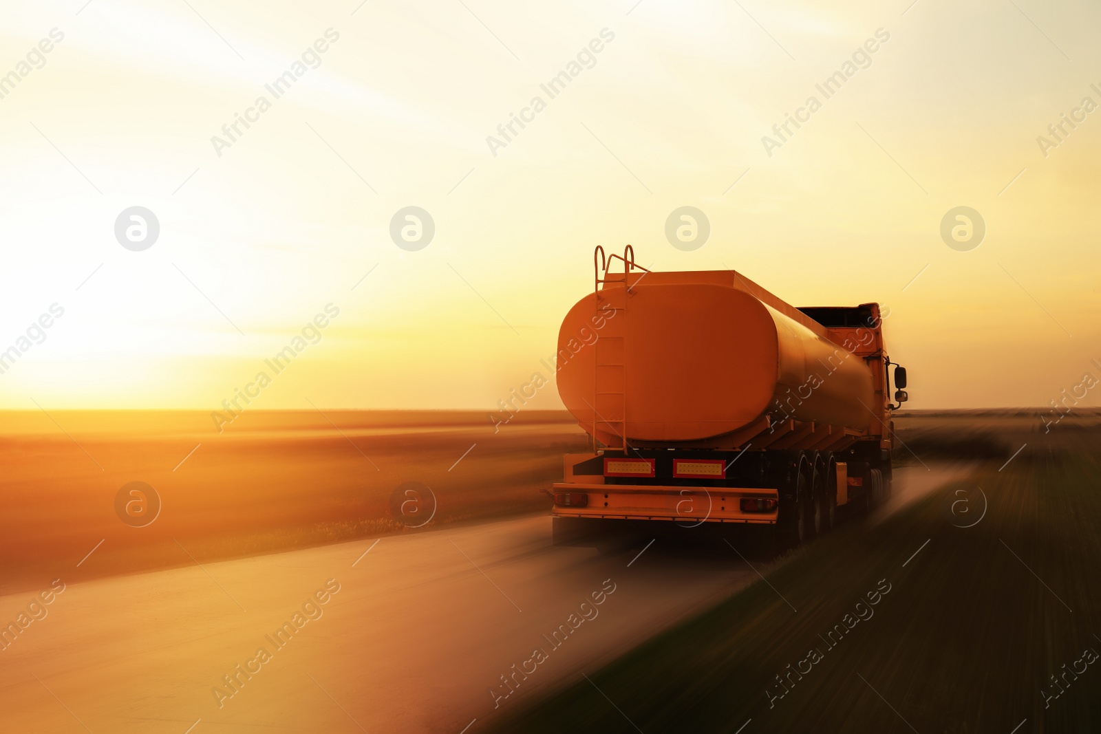 Image of Logistics concept. Truck on country road, motion blur effect 