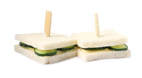 Photo of Tasty fresh cucumber sandwiches on white background