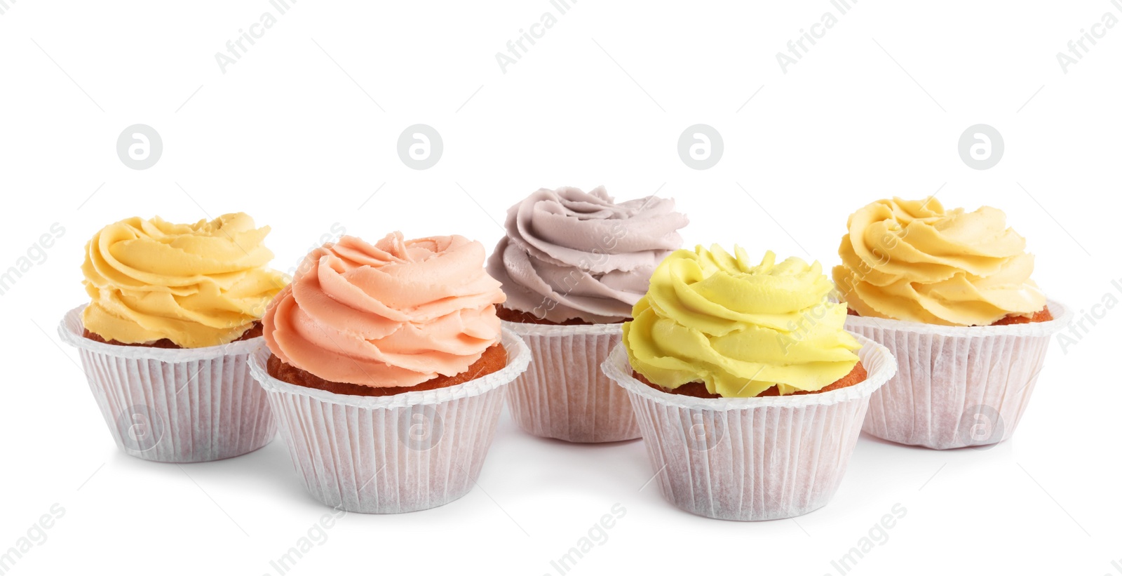 Photo of Tasty cupcakes with cream isolated on white